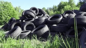 Lot of old tires from cars in the open air. Video full hd.