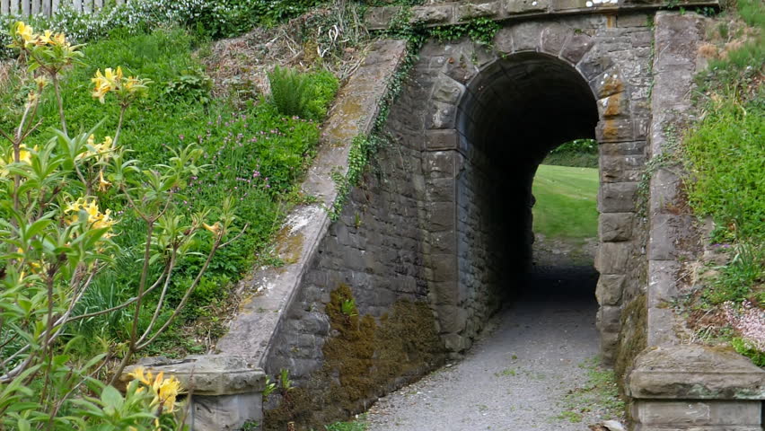 Example of an old British architecture - arch passage for pedestrians under the railway track