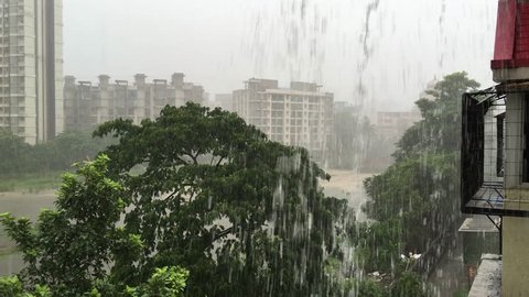 Monsoon raining in Mira road sub urban area water and high rise buildings
 Mumbai city maharashtra state / India
filmed on 9th June 2018