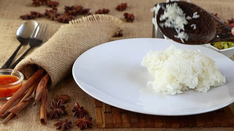 Still life photography of food : Steamed Jasmine rice on white plate. Shooting in studio, Clean food good taste idea concept.