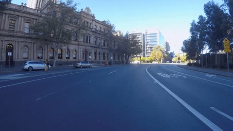 Adelaide, South Australia - April 29, 2018: Action camera vehicle POV driving along east side of Victoria Square.