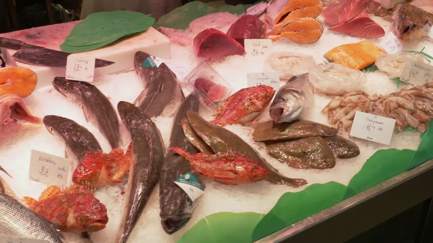 Dolly shot above a Fresh Fish stand in La Boqueria market, Barcelona.