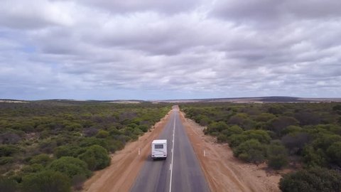 Aerial Drone follows a car - Australian beautiful Nature green Landscape 4k