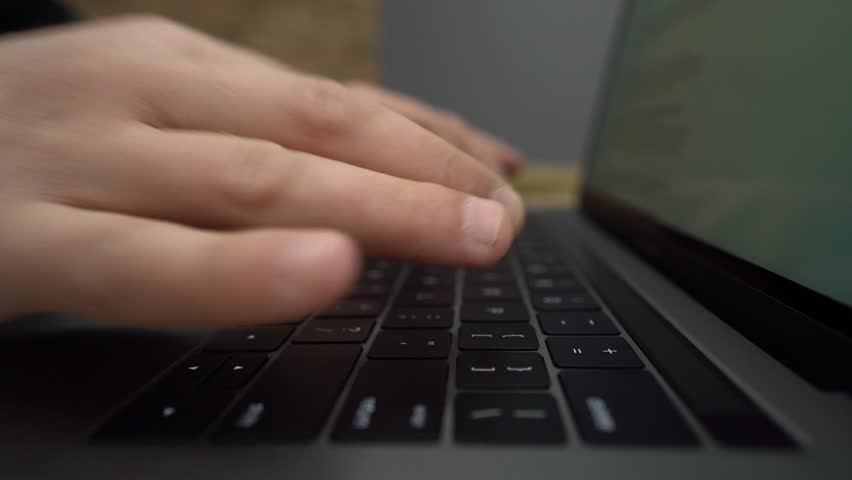 Close-up of male hands using laptop, at office or home | Shutterstock HD Video #1012168097