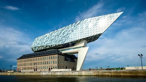 ANTWERP, BELGIUM - MAY 27, 2018: Timelapse of port authority house (Porthuis) designed by famous Zaha Hadid Architects which was her last project