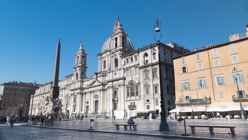 Sant Agnese in agone famous church and obelisk, time lapse in Navona place travel destination in Rome