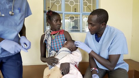 Doctors working in neonatal clinic. Kenya.