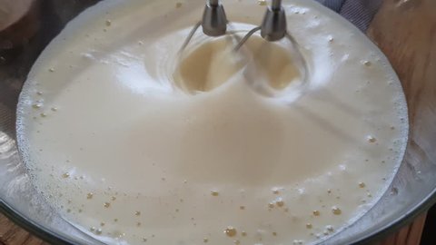 mixer whipping dough for pancakes