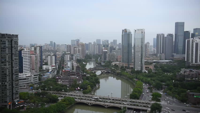 Areial view of Anshun Bridge above Jinjiang river, and downtown of Jiuyanqiao in the daytimw, Chengdu, Sichuan, China