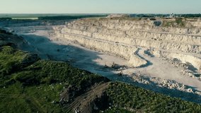4K drone aerial footage. Fly over a mountain stone quarry.