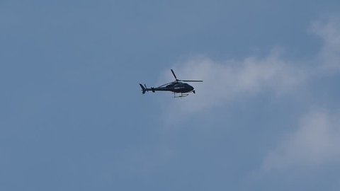 LONDON, UK - CIRCA JUNE 2018: BBC News helicopter hovering over London for live aerial footage