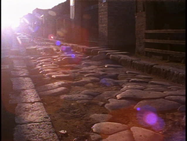 ITALY, 1999, Pompeii, street in the ruins, backlit