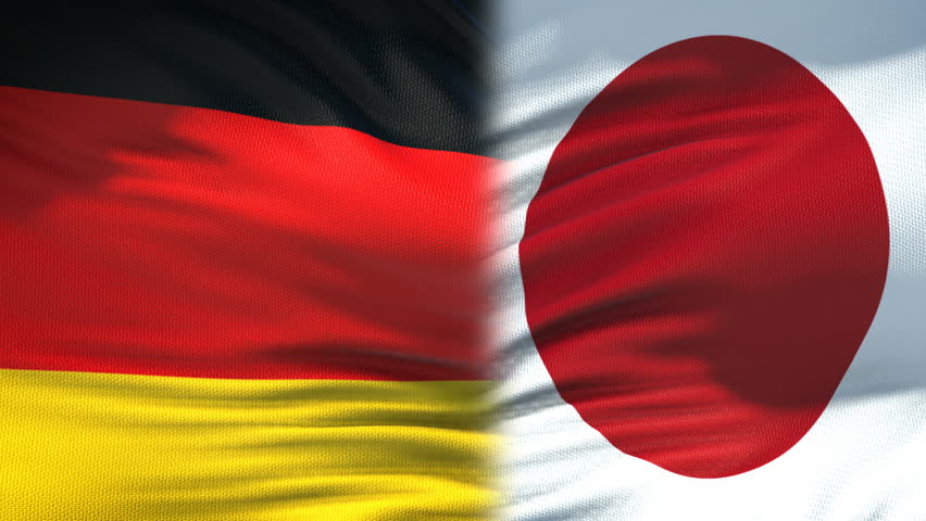 Germany and Japan handshake, international friendship relations, flag background