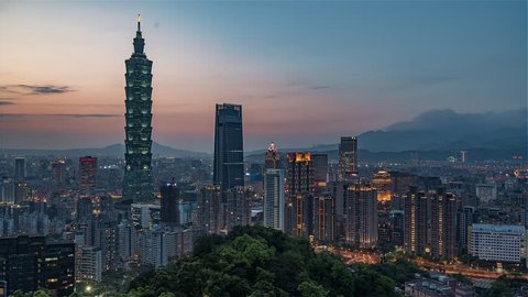 4K Timelapse Sequence of Taipei, Taiwan - Medium shot of Taipei's downtown from day to night