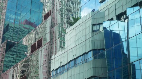 sunny day shenzhen city downtown buildings front sky reflection slow motion 4k china