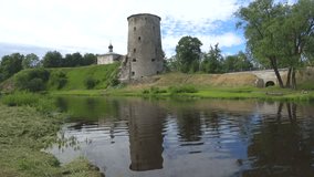 View of the old tower on a cloudy June day. Pskov, Russia