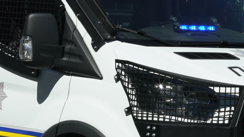 Patrol police car parked on street, maintenance of public order, national guard