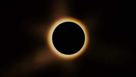 Full solar eclipse.The Moon mostly covers the visible Sun creating a diamond ring effect.This astronomical phenomenon can be seen as a sign of the End of the World.