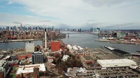  This video shows aerial views of  downtown Brooklyn, Dumbo, Vinegar Hill, New York Housing, and the Manhattan Bridge.  Skyline views of downtown Brooklyn and New York City are in the back drop.   