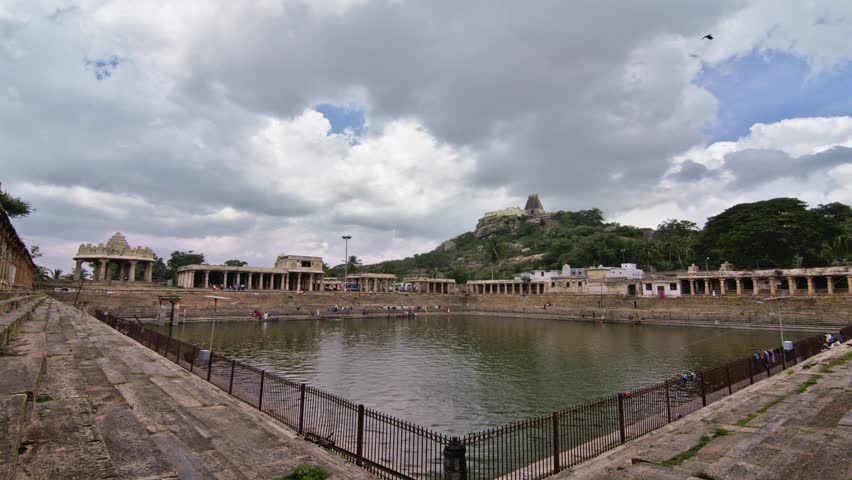 Wide angle shot of temple pond of Melukote, a temple town near Bangalore, time lapse