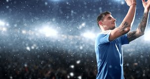 Soccer player celebrates a victory and claps his hands happily on the professional stadium while it is snowing. Stadium and crowd are made in 3D and animated.