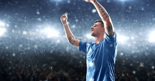 Soccer player celebrates a victory and claps his hands happily on the professional stadium while it is snowing. Stadium and crowd are made in 3D and animated.