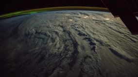 A flight over the earth's surface, taken from a space station. Elements Of This Video Furnished By Nasa