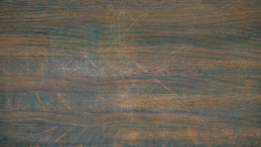 Closeup of hand draws on a wooden board. Image of an electric vehicle.