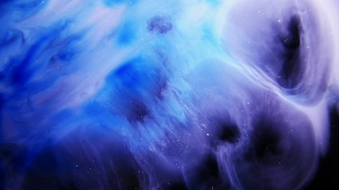 Blue Colorful Ink And Paint Liquid Reaction / Cosmos Nebula background