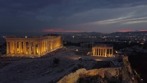 Athens Acropolis, Parthenon and  temple of Erechtheio. Captured in 4k aerial drone view from above at sunset 