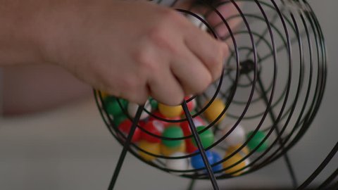 A bingo cage spinning