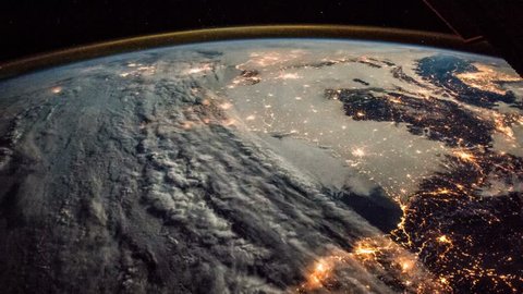 Time lapse of the planet earth from SIS. City lights at night.  France, Spain, Italy and mediterranean islands. Elements of this image courtesy of NASA