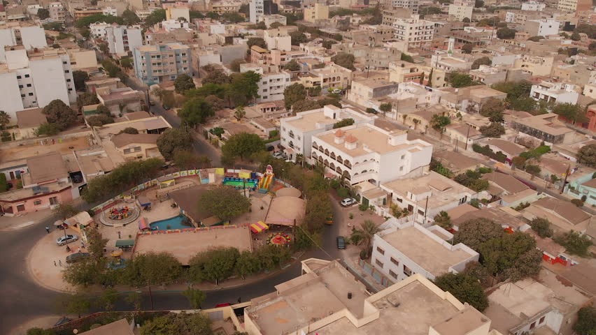 Aerial of Dakar, Senegal with children's playground in Point E district. Royalty-Free Stock Footage #1012383326
