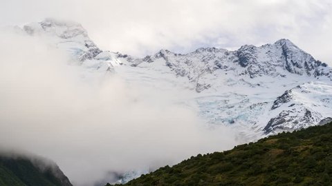 Cloud moving around Mount Sefton (Maukatua in Maori) view from Hooker valley in the Aroarokaehe Range of the Southern Alps of New Zealand. (Time lapse)