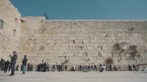 Jerusalem, Israel - February 15, 2018: The camera moves toward the Wailing Wall, where jews pray