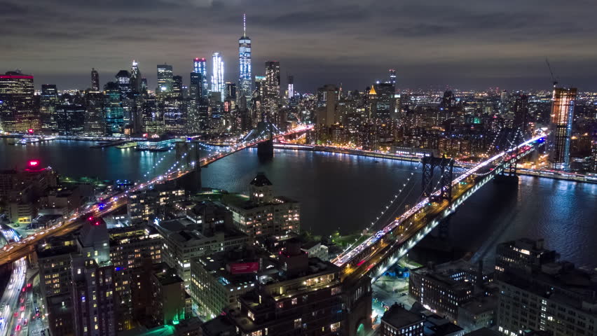 Aerial night view of Manhattan, New York City. Tall buildings. Timelapse dronelapse. NY from above. Royalty-Free Stock Footage #1012402256