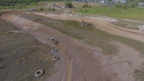 10 June 2018 Russian Federation, Bryansk region, Ivot - Extreme sports, cross-country motocross. Aerial and video in motion. Camera in motion.