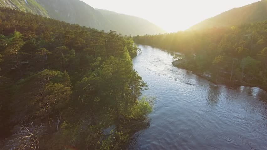 Aerial view of Rapid Stunning Waterfall in Husedalen Valley, Norway. Summer time.