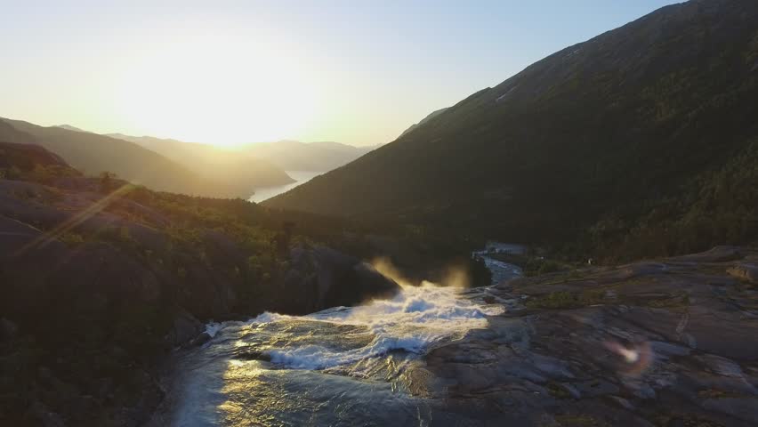Aerial view of Rapid Stunning Waterfall in Husedalen Valley, Norway. Summer time. Nykkjesøyfossen