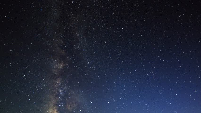 Stars draw fading lines and clouds over Mount Elbrus. Night landscape. Russia. Traces in the form of a line from the stars | Shutterstock HD Video #1012417832