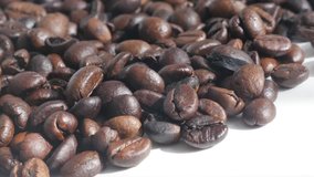 Roasted coffee beans background 4K panning footage