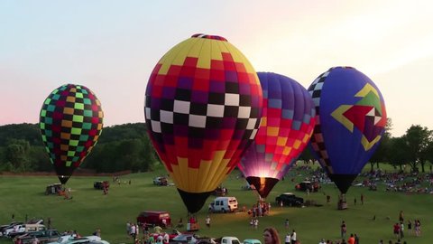 Galena, IL - June 16 2018: Hot air balloons light up the night at the annual Great Galena Balloon Race charity event with this years event raising money for Juvenile diabetes and camp Hertko Hollow.
