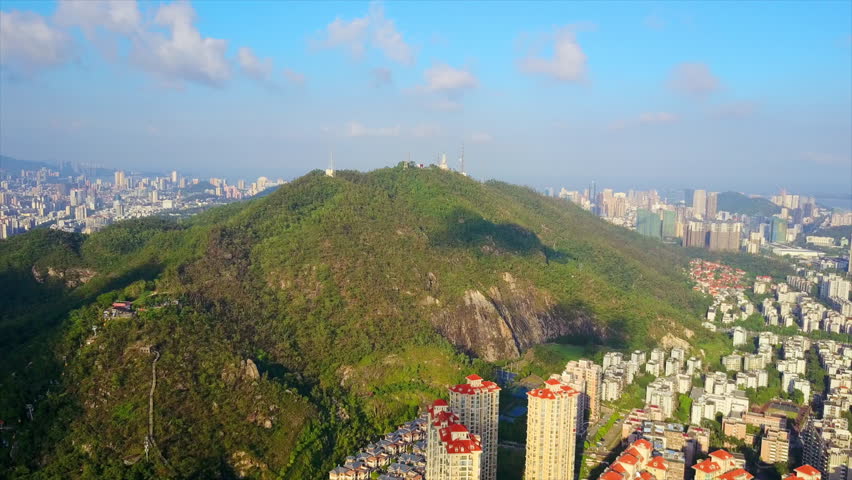 sunny day zhuhai cityscape new nuanming park mountain aerial panorama 4k china