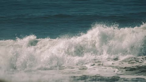Closeup Of Waves, Breaking At A Beach (180fps Slow Motion). Graded and stabilized 180fps Slow Motion version. 