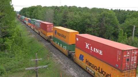 MACTIER, CANADA on June 17th: Freight train passes on June 17th, 2018 in Mactier, Canada. Canadian Pacific Railway owns approximately 20,000 kms of track across Canada and into the United States.