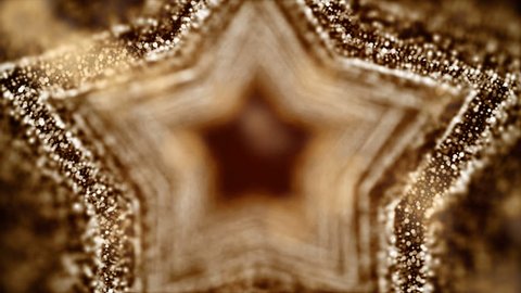 Golden particles in motion, in the form of star.