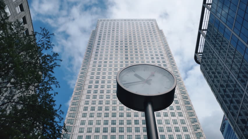 Time lapse. A street clock in a business district. London.