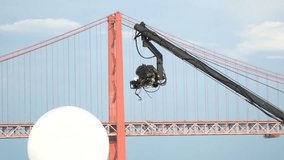 Live event video camera on crane over white