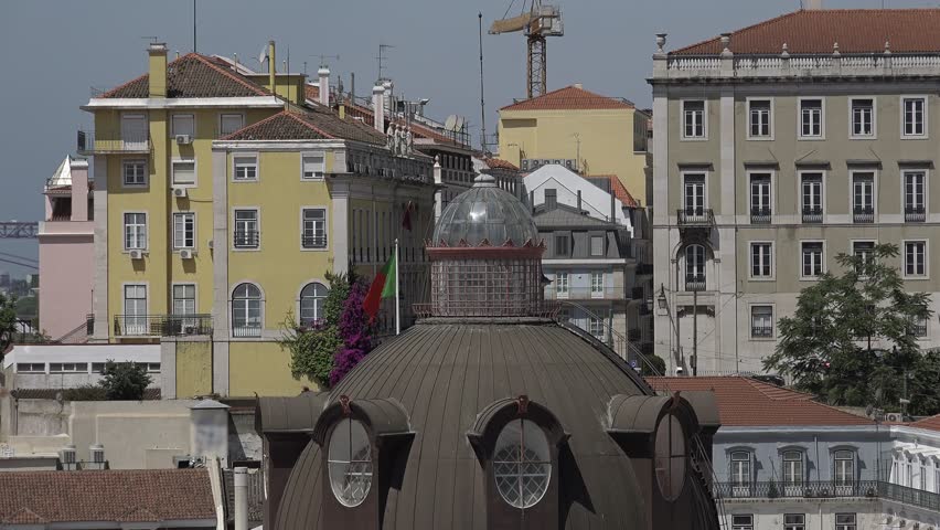 Portuguese Flag On Top Of Lisbon City Hall. Pacos Do Concelho De Lisboa is the seat of the Lisbon municipal government. It houses the Camara Municipal de Lisboa.