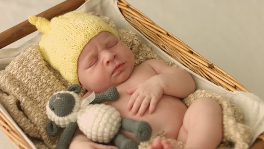 hat on newborn while sleeping